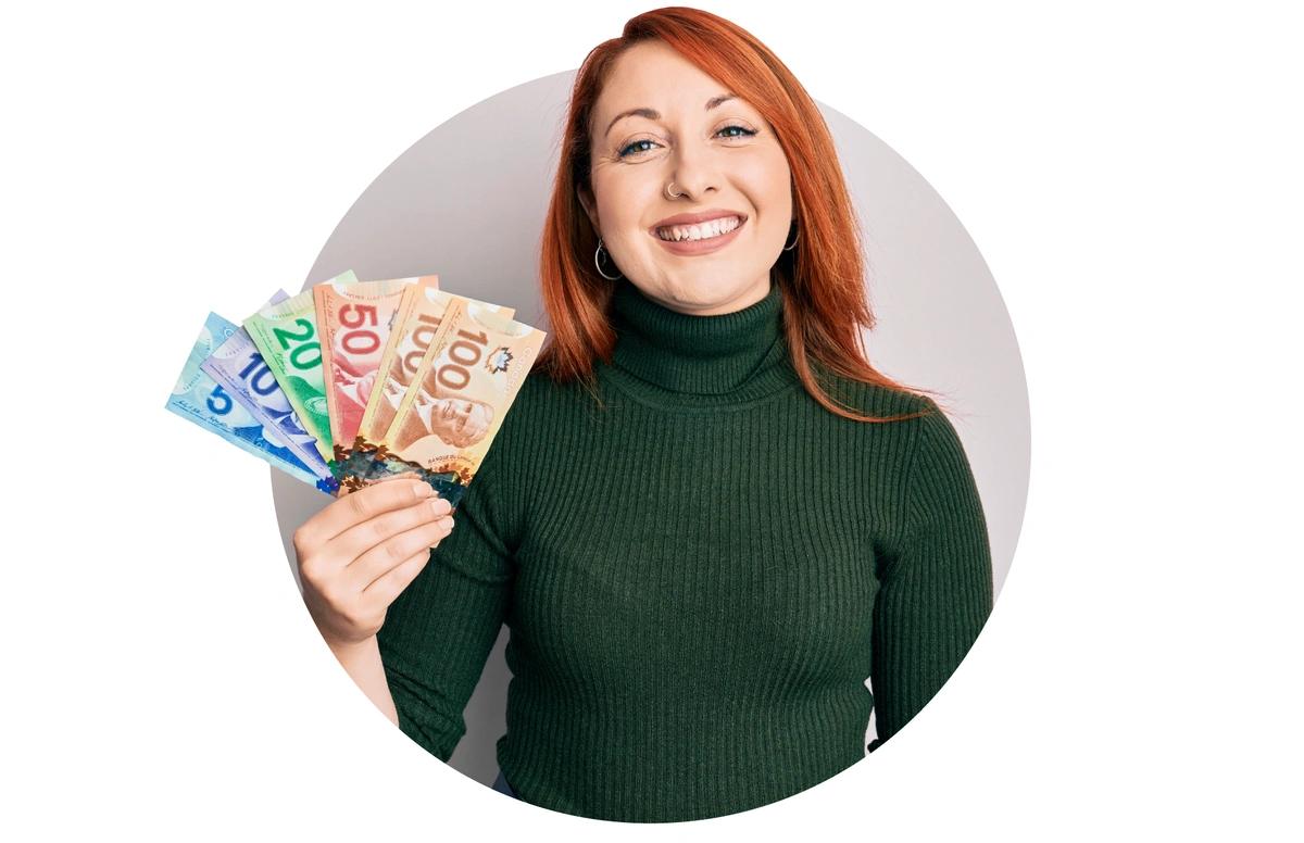 woman holding canadian money