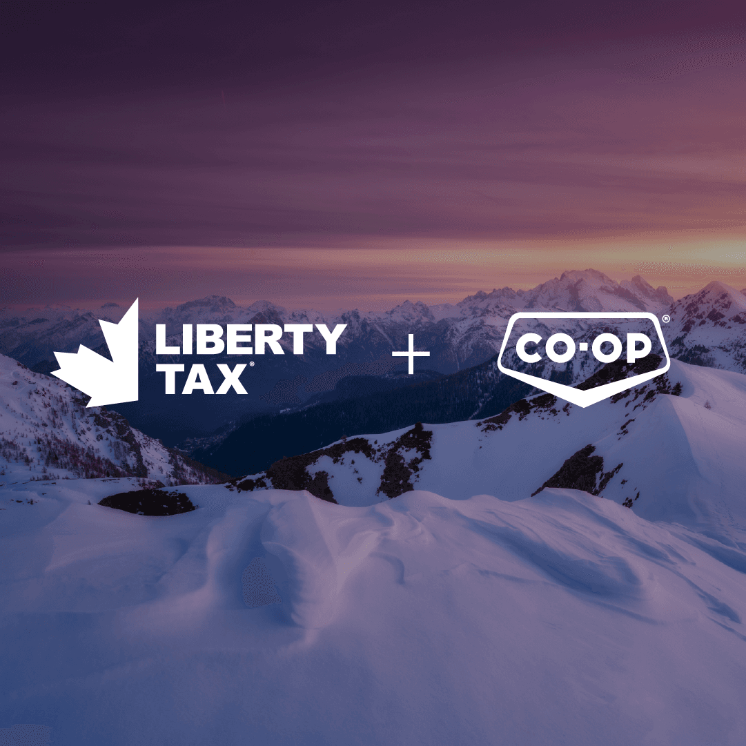 LT and Arctic co op logo over mountains